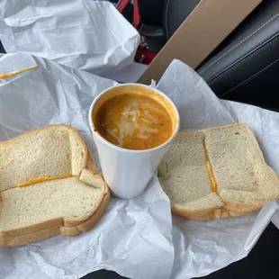 Soup with two grill cheese