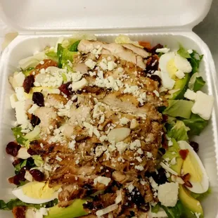 a chicken salad in a styrofoam container