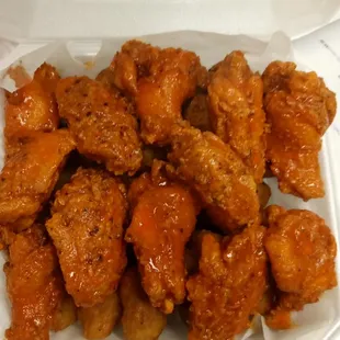 chicken wings in a styrofoam container