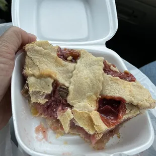 Strawberry rhubarb pie, partially in my belly.