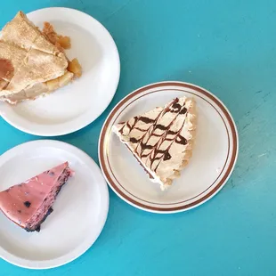 Top: Apple Pie Bottom left: raspberry chocolate chip cheesecake Bottom right: combination. Peanut butter and brownie