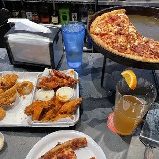 Wings, pizza, onion rings and a draft