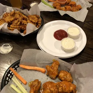 Boneless wings and waffle fries yummo
