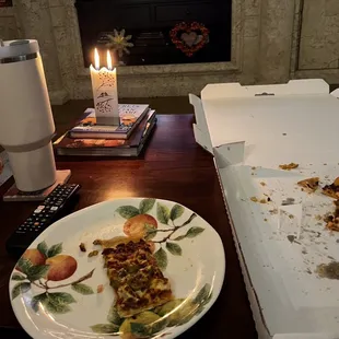 Last piece of the Extra Large Super Deluxe Pizza..delicious
