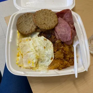 2 XL Eggs with Meat, Toast, Home Fries or Grits