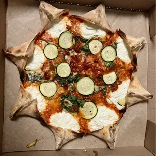Star Michele, ricotta, mozzarella, Italian tomato sauce spinach, zucchini, roasted peppers - delish! (02/02/24)
