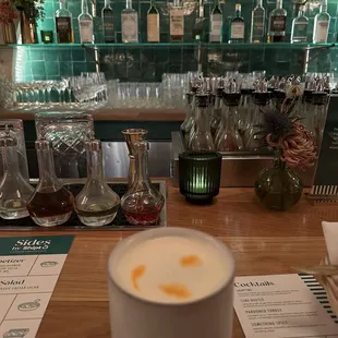 a cup of cappuccino on a bar