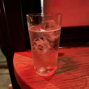 a glass of water on a table