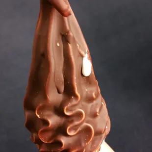 Soft serve vanilla ice cream with chocolate dip