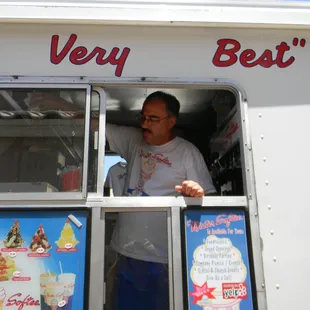 a man looking out the window