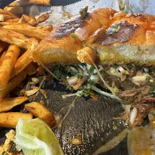 Birria torta. Was so good I forgot to take a picture before we started eating.