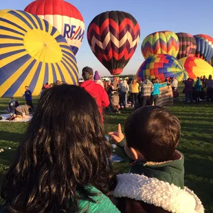 My loves enjoying the hot air balloons