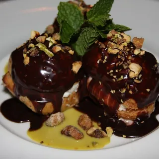 Classic Profiteroles w/ Vanilla Ice Cream, Dark Chocolate Sauce & Pistachio Croquant