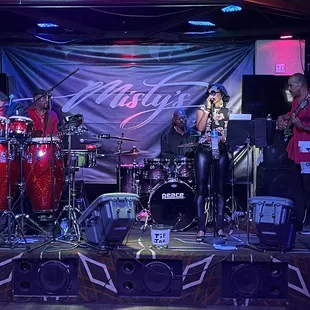 a band performing on stage