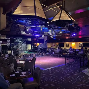 a bar with purple lighting