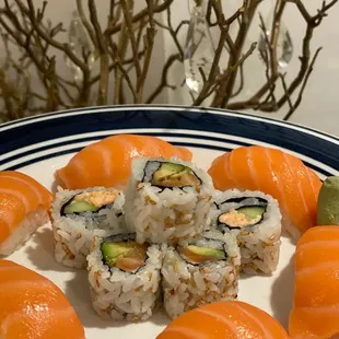a plate of sushi rolls