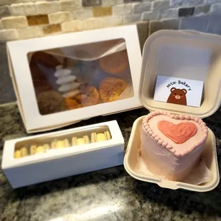 a heart shaped cake in a box
