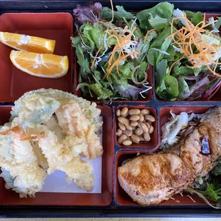 Salmon bento box with shrimp tempura and double salad