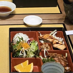 Chicken/salmon teriyaki and tempura/California roll bento boxes