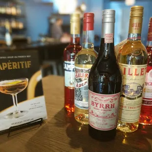 Books and booze go great together. We have them both at Mitch e Amaro.