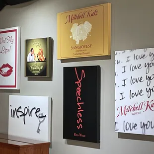 a variety of posters on the wall