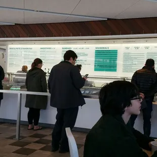 This is the counter where are all the flavors are on display and the staff is dipping from them and the register it&apos;s over on the left.
