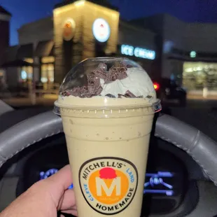 Sea Salt Caramel Shake w/ the shop in the background