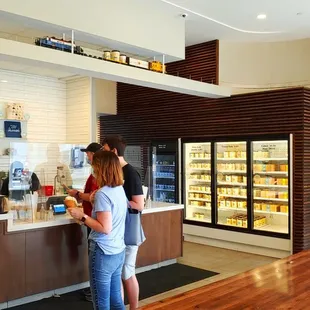 a woman standing at the counter