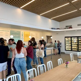 a large group of people standing in line