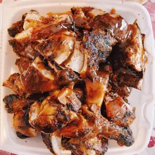Jerk chicken with jerk sauce. You can choose between jerk sauce and bbq sauce, but either way, you might want to ask for extra sauce!