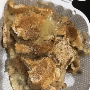 a dish of food in a styrofoam container