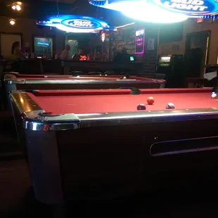 pool tables and neon lights