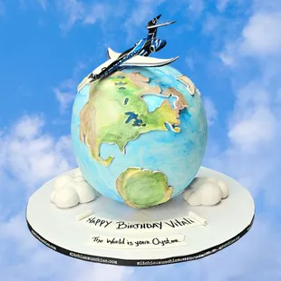 a birthday cake with a plane on top