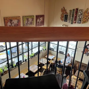 Inside upstairs seating area overlooks the entrance