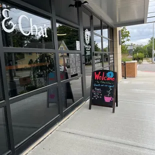 the entrance to a coffee shop
