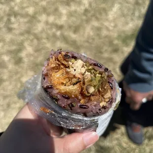 Purple Rice Burrito - inside has youtiao, pickles, tofu, etc