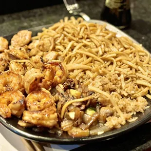 This was my leftovers. Chicken, giant shrimp, noodles, veggies.