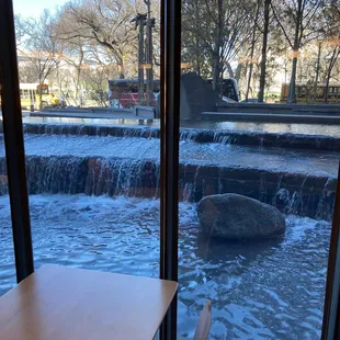 a view of a waterfall through a window