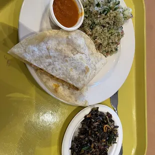 a plate of food on a tray