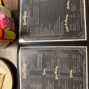a menu and a slice of pizza