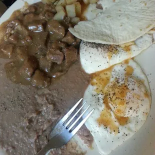 Carne Guisada plate