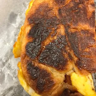 Menu says soft and flaky croissant...but the cook decided to press it and burn it like a piece of cuban bread??