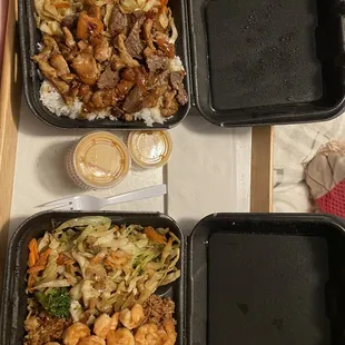 three trays of food