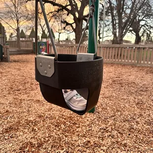 My daughter wanted to use the swing but we saw this random shoes just lying in the there