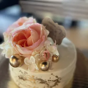 a closeup of a wedding cake
