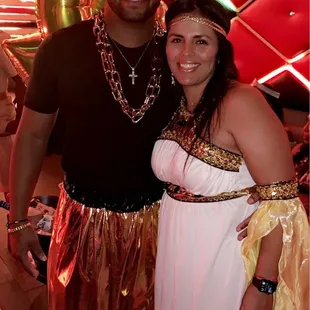 a man and a woman dressed in costume