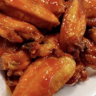 a plate of chicken wings