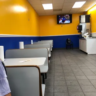 a man sitting at a table in a restaurant