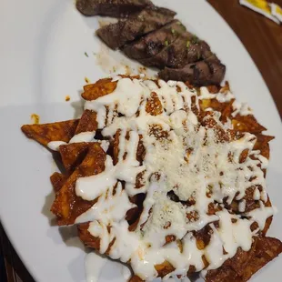 Steak with Mole chilaquiles
