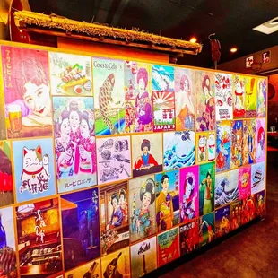 a large display of posters